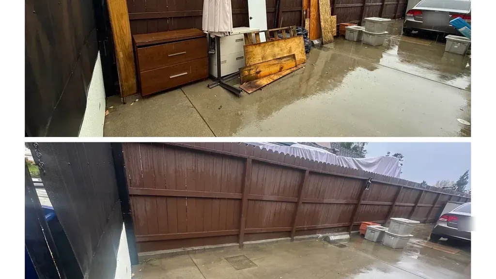 A side yard holding a dresser; a patio umbrella; plywood and other furniture; and the same yard cleared